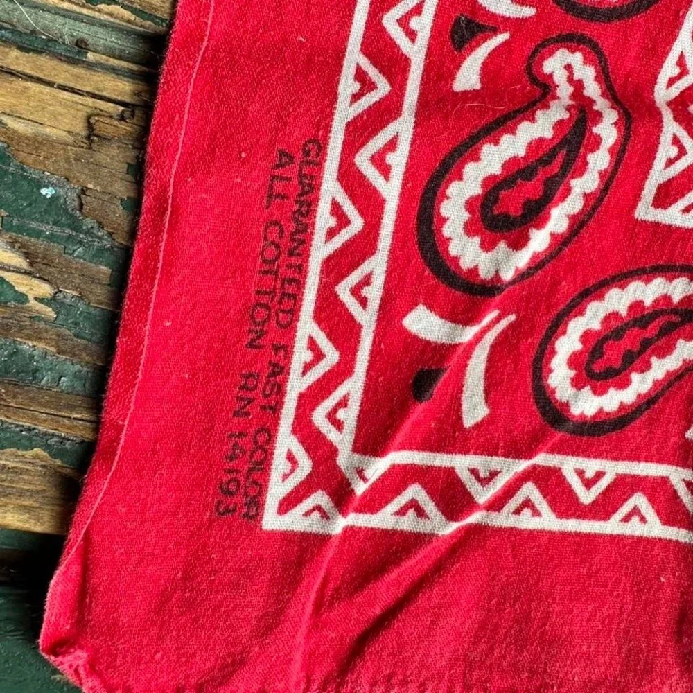 Red bandana scarf with‎ white paisley design